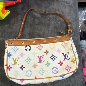 Used authentic Louis Vuitton clutch.